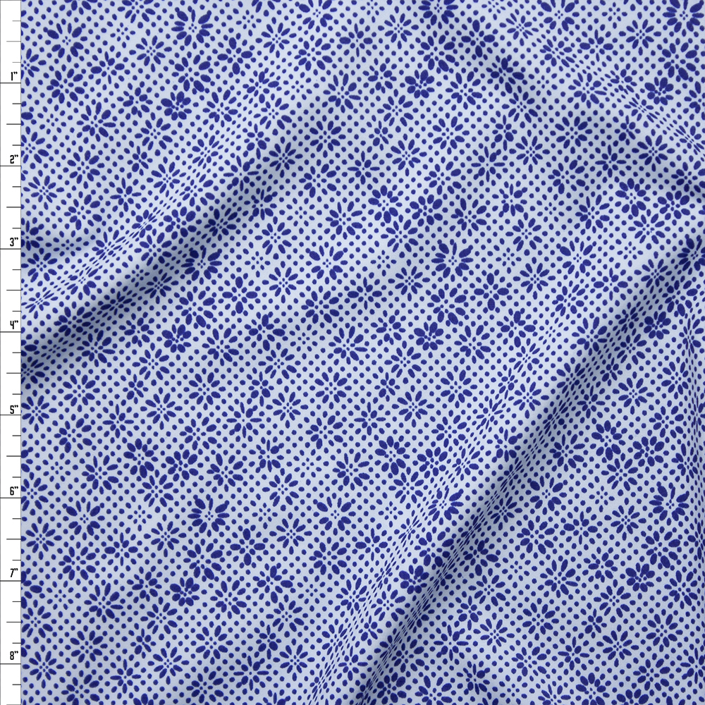 Blue Dots and Flowers on White Nylon/Spandex Fabric By The Yard
