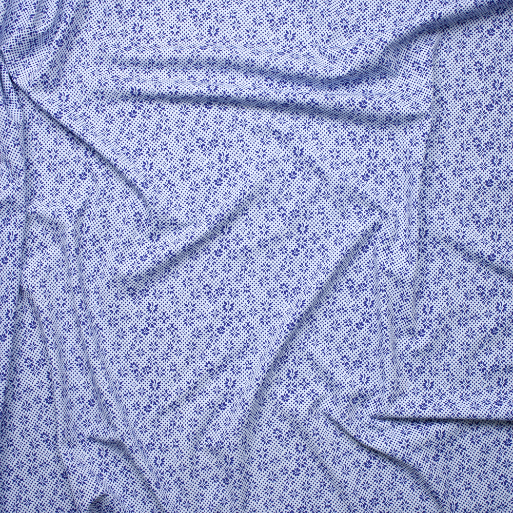 Blue Dots and Flowers on White Nylon/Spandex Fabric By The Yard - Wide shot