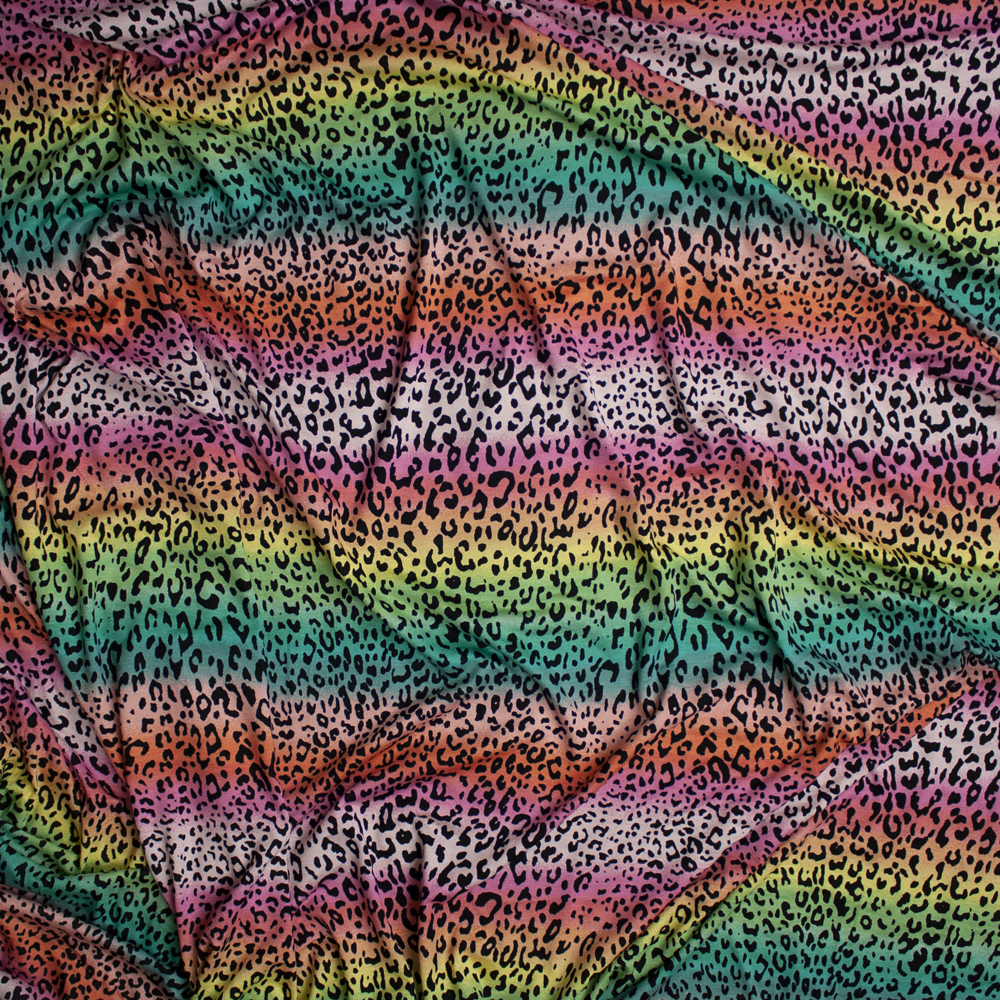 Cheetah Print on Bright Pink, Yellow, and Green Ombre Rainbow Stretch Rayon Jersey Knit Fabric By The Yard - Wide shot