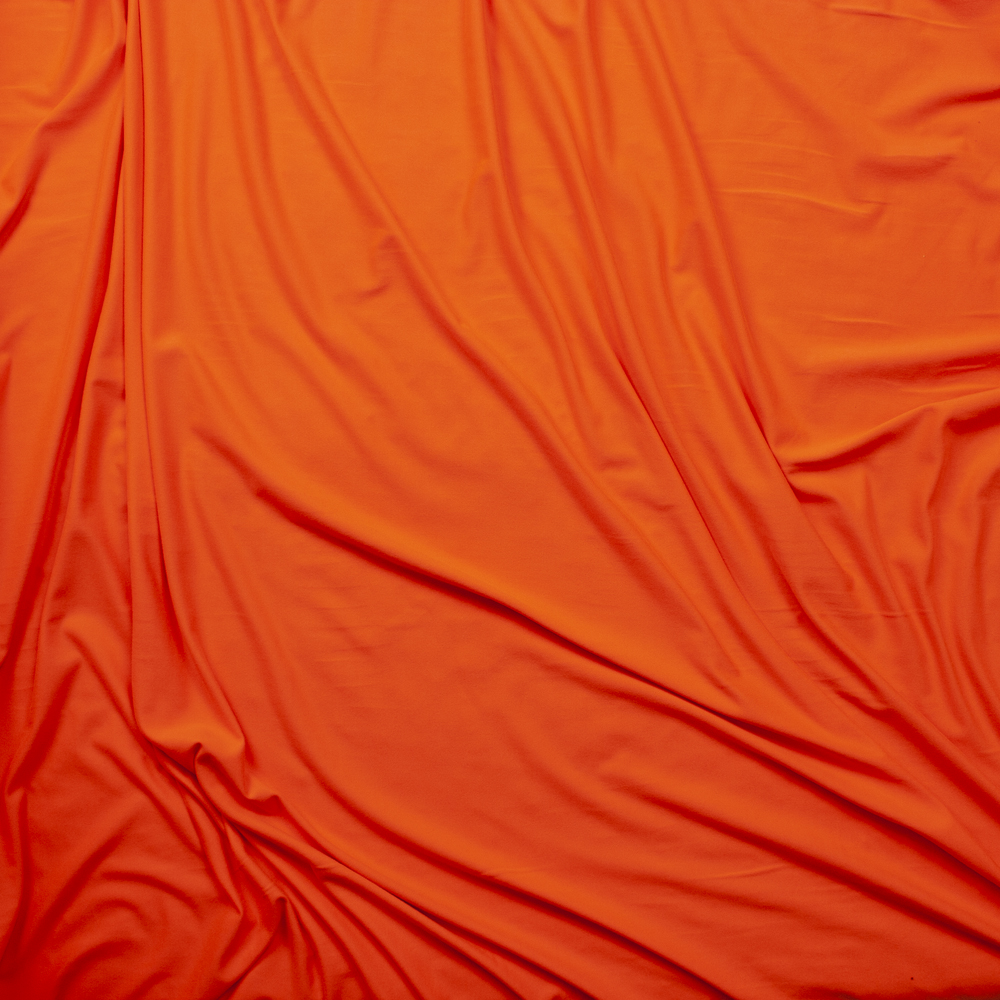 Neon Orange Double Brushed Poly Spandex Knit Fabric By The Yard - Wide shot