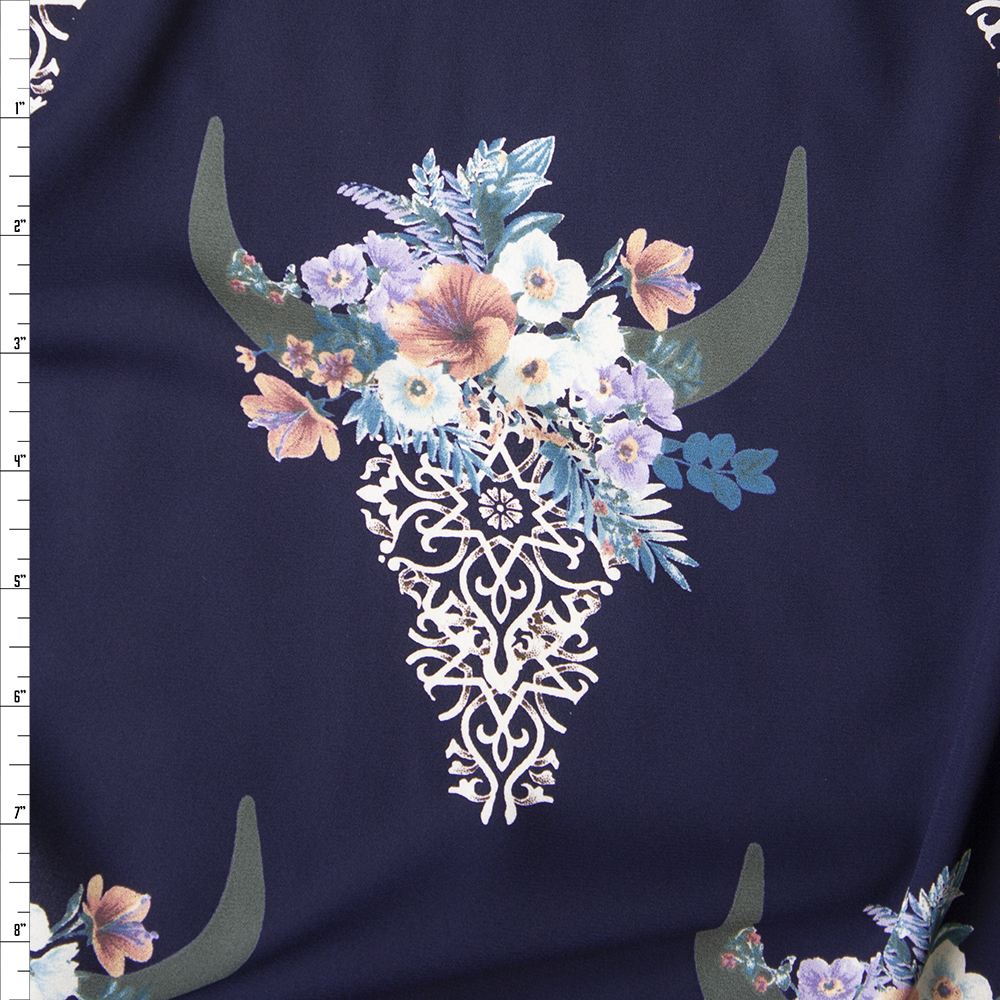 Ivory Lacey Cow Skulls with Blue and Pink Rose Crowns on Navy Blue Georgette Fabric By The Yard