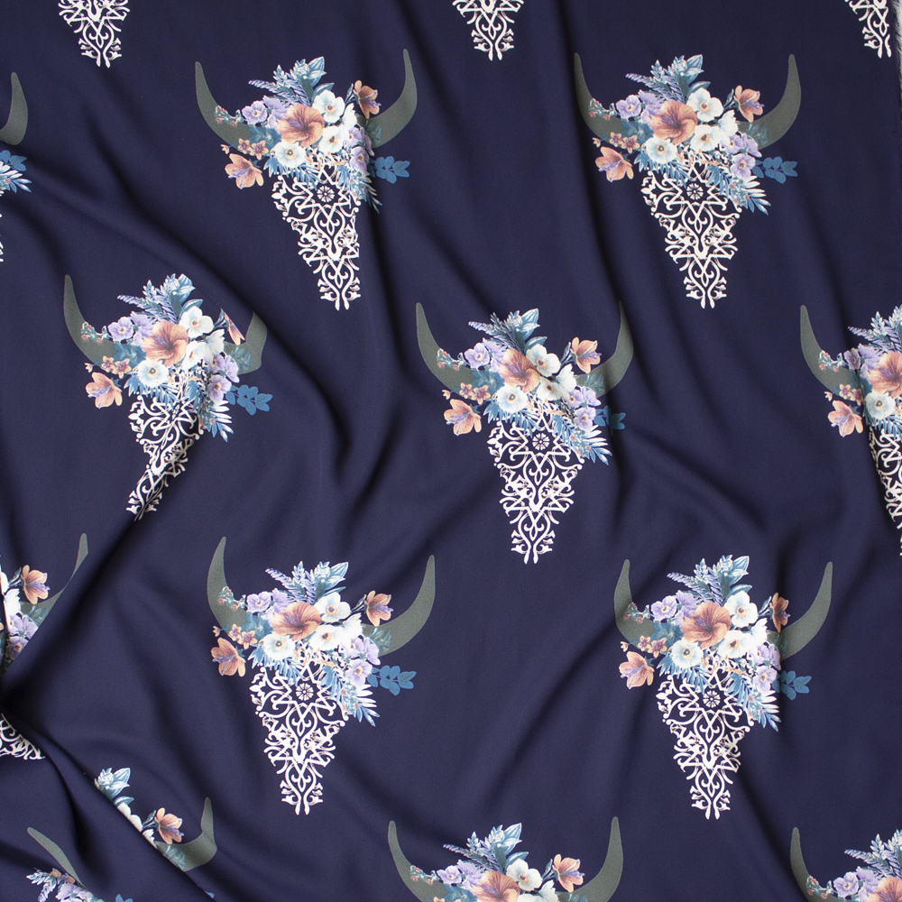 Ivory Lacey Cow Skulls with Blue and Pink Rose Crowns on Navy Blue Georgette Fabric By The Yard - Wide shot