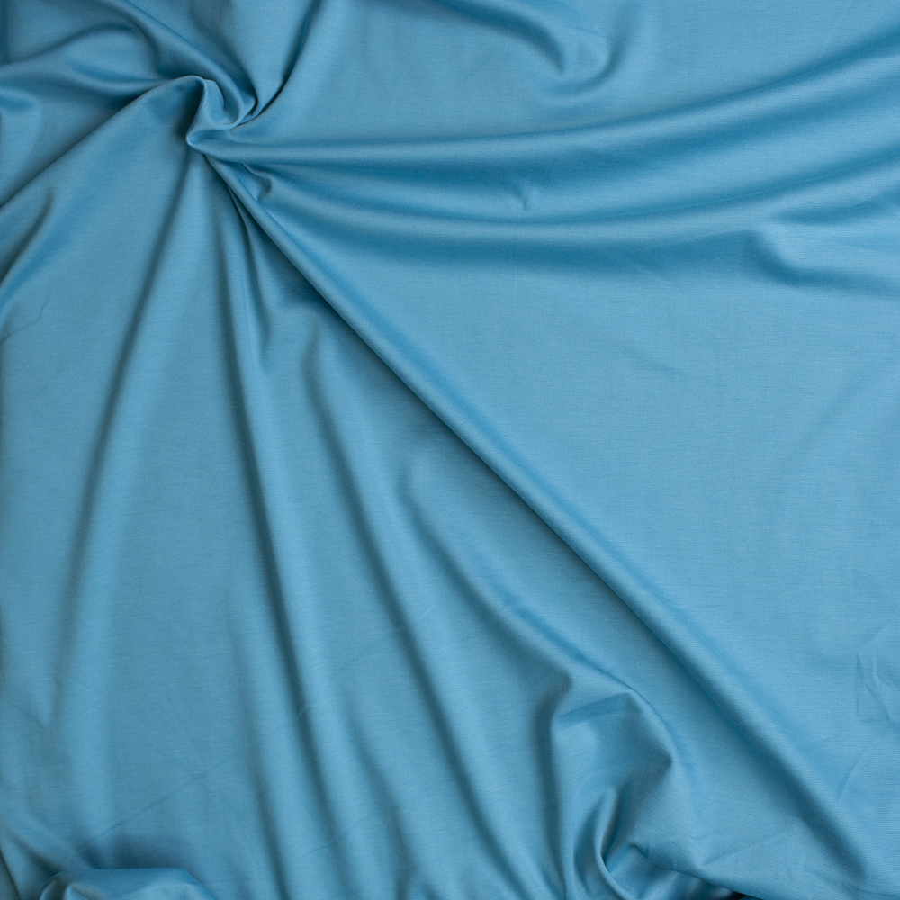 Bright Sky Blue Solid Ponte De Roma Fabric By The Yard - Wide shot
