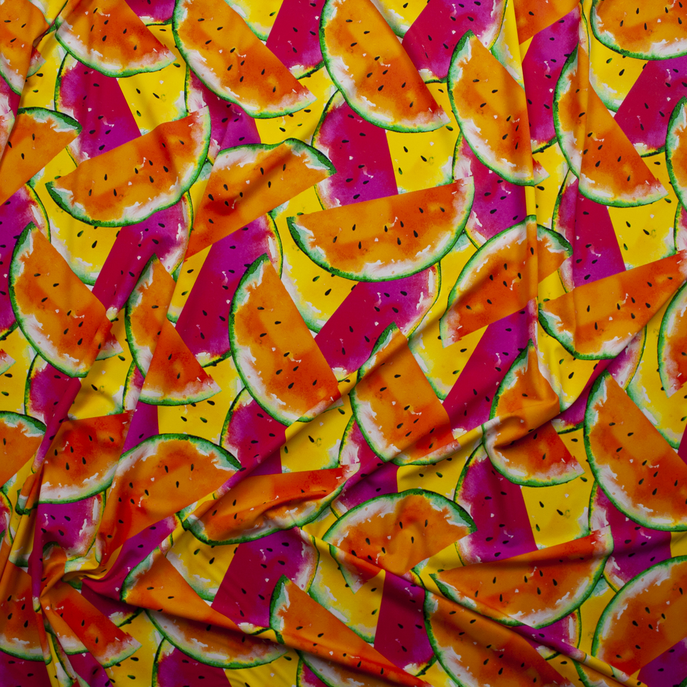 Orange, Pink, and Yellow Tossed Watermelons Premium 5.8oz Nylon/Spandex Fabric By The Yard - Wide shot