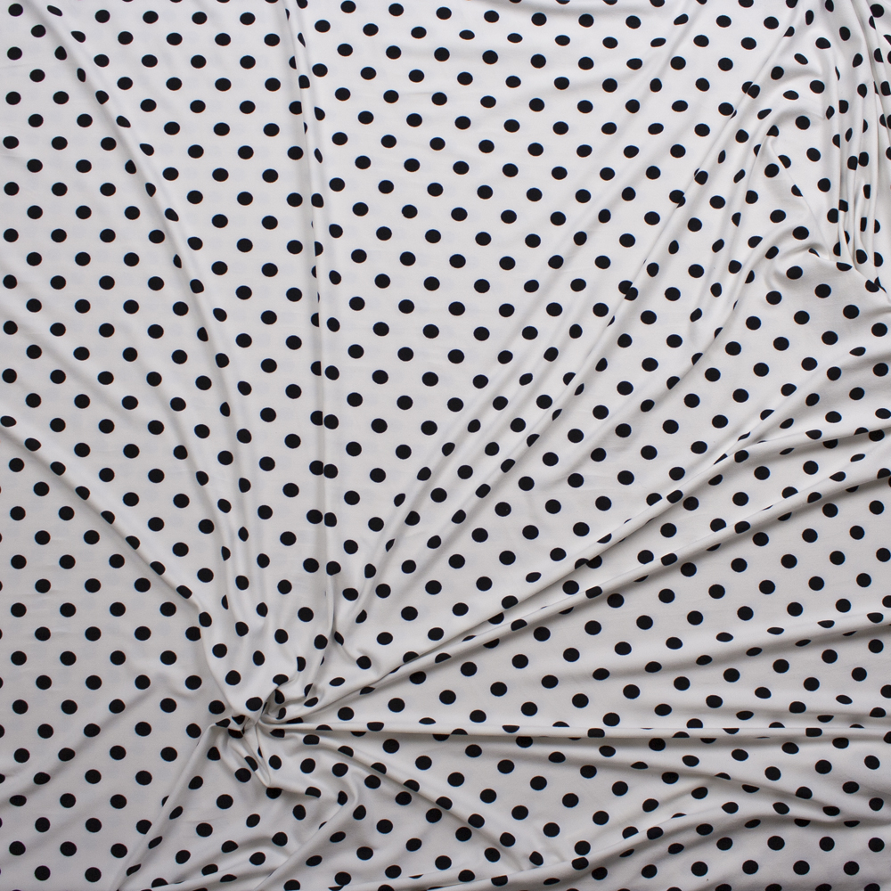 Black on Offwhite 1/2” Polka Dot Double Brushed Poly/Spandex Knit Fabric By The Yard - Wide shot