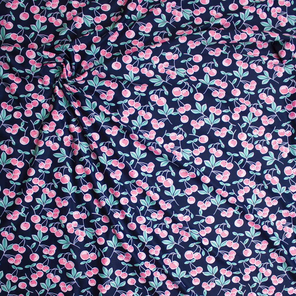 Pink and Mint Cherries on Navy Stretch Nylon/Lycra Knit Fabric By The Yard - Wide shot