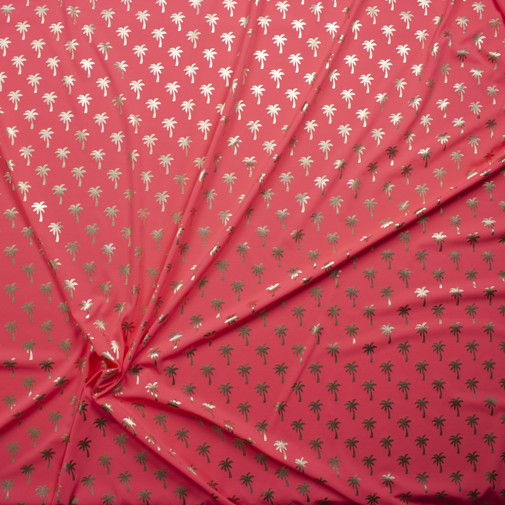 Metallic Gold Palm Trees on Neon Pink Stretch Nylon/Lycra Knit Fabric By The Yard - Wide shot