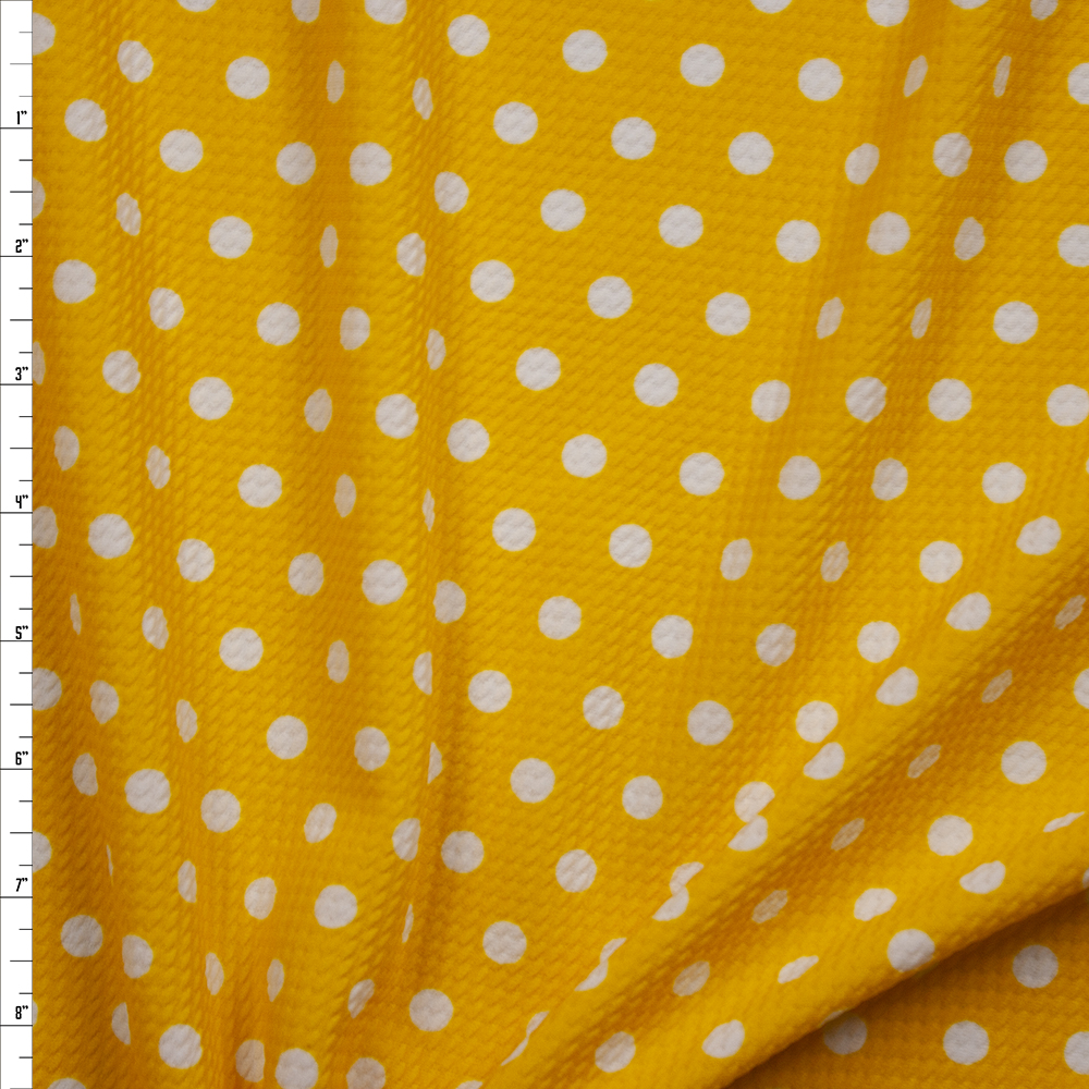 White on Bright Yellow Polka Dot Bullet Liverpool Knit Fabric By The Yard