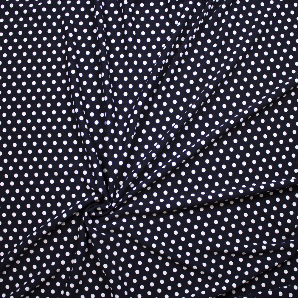 White on Midnight Blue Polka Dot Bullet Liverpool Knit Fabric By The Yard - Wide shot