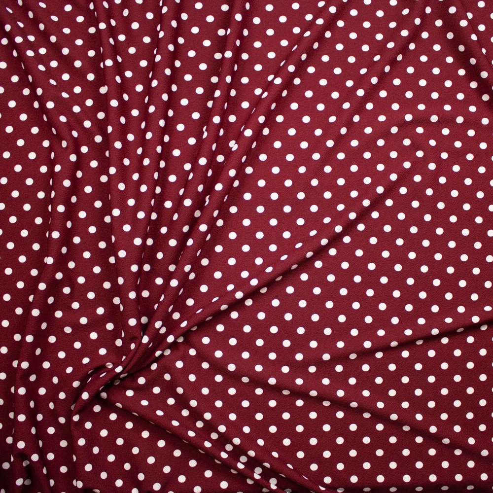 White on Burgundy Polka Dots Crepe Like Liverpool Knit Fabric By The Yard - Wide shot