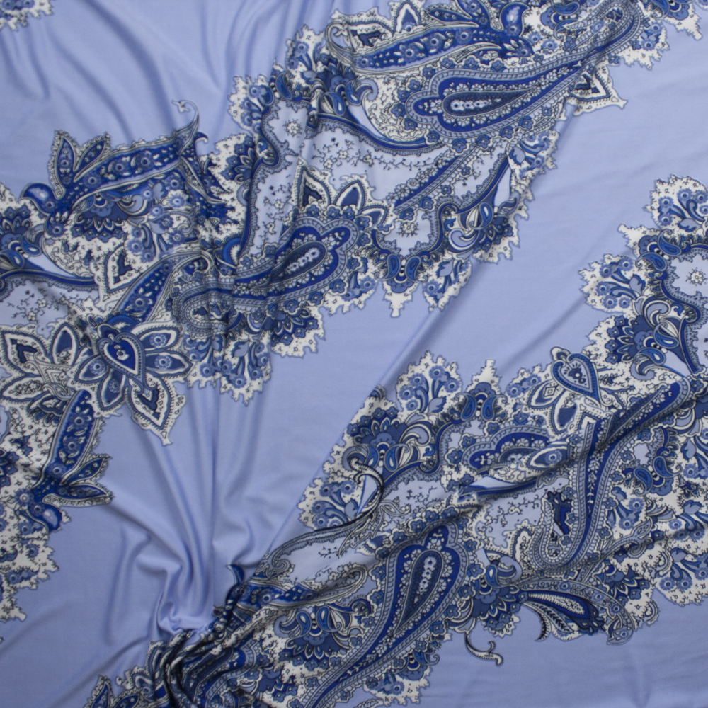 Blue and White Paisley Diagonal on Light Blue Poly/Spandex Knit Fabric By The Yard - Wide shot