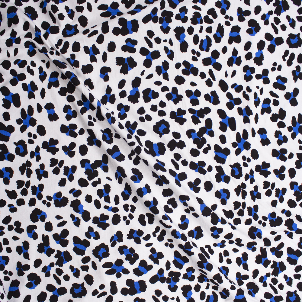 Black and Bright Blue Leopard Print on White Cotton French Terry Fabric By The Yard - Wide shot