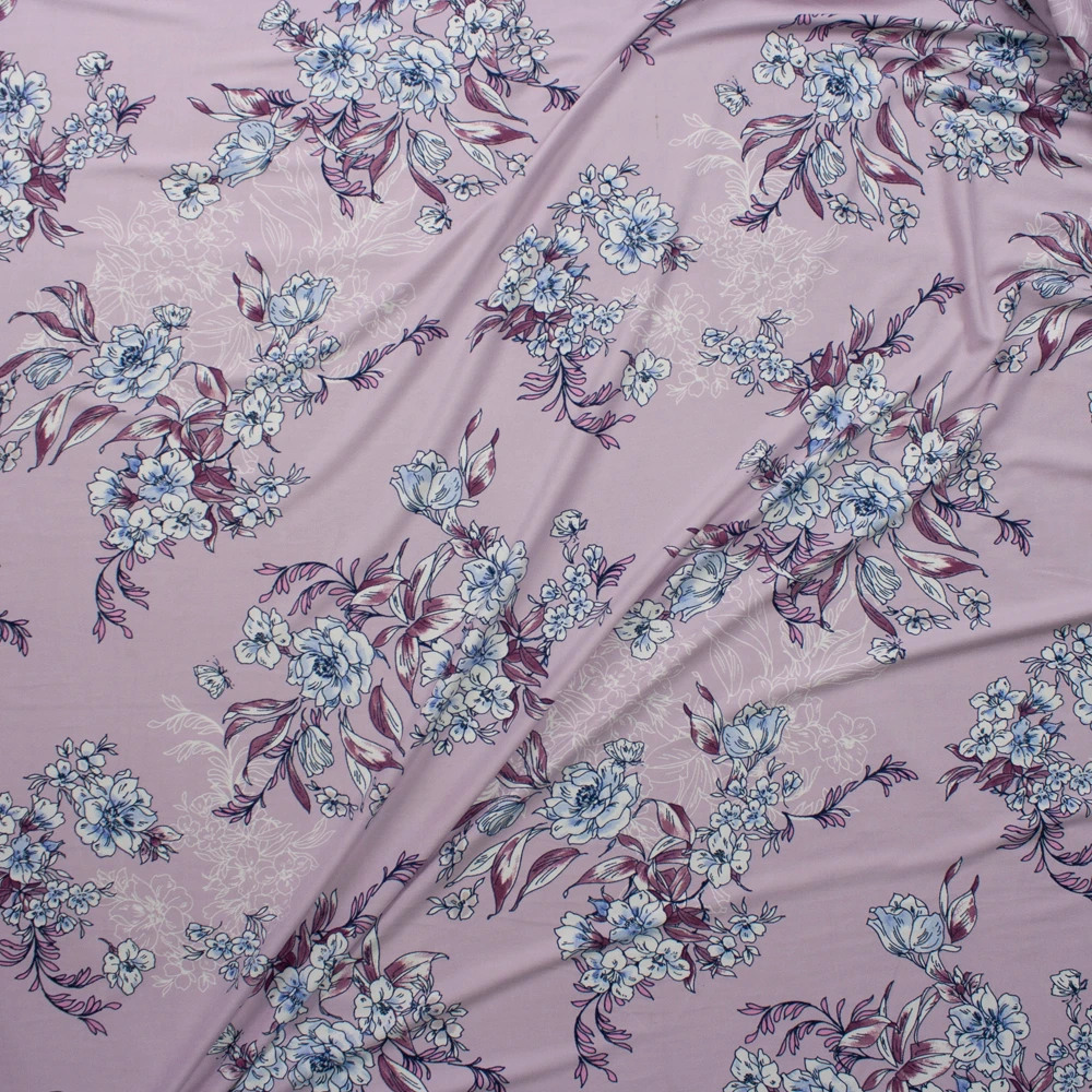 White, Light Blue, and Plum Floral on Pale Lavender Double Brushed Poly Spandex Knit Fabric By The Yard - Wide shot