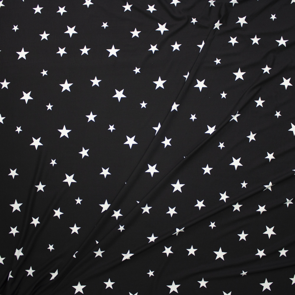 White on Black Stars Double Brushed Poly Spandex Knit Fabric By The Yard - Wide shot