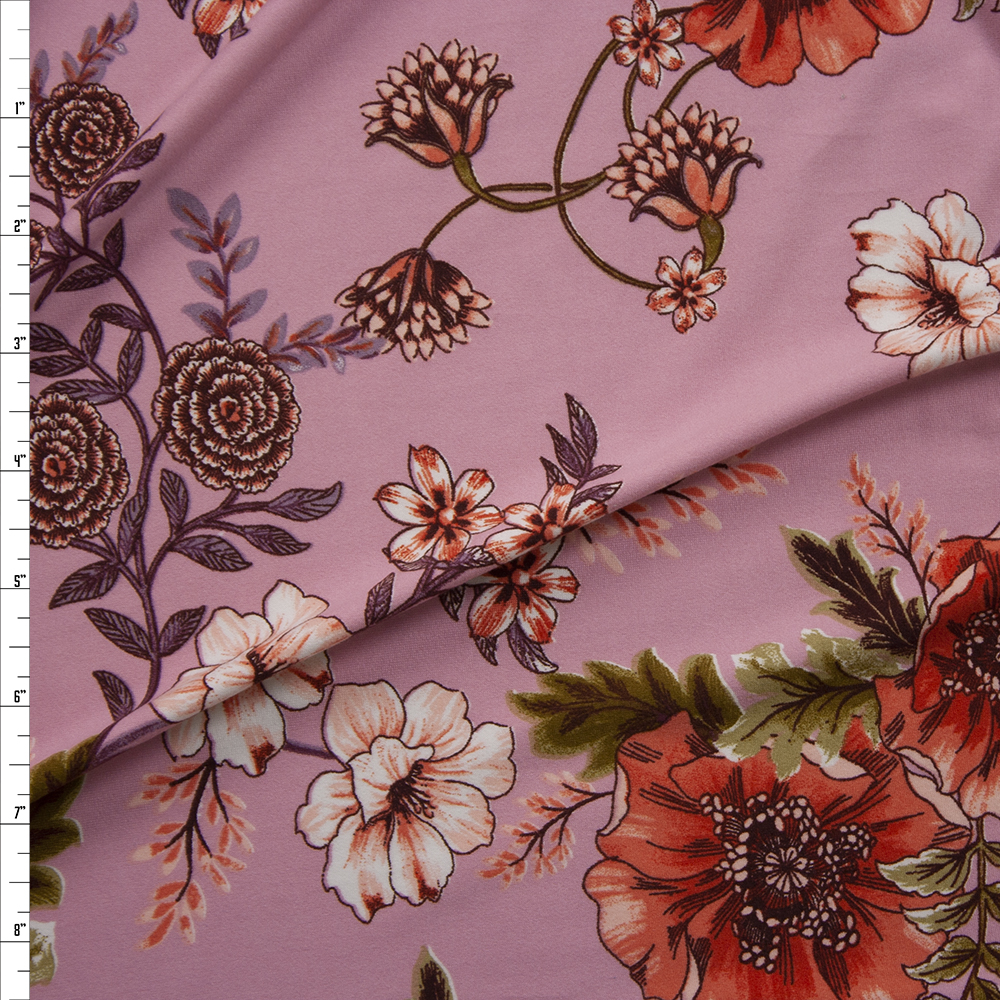 Scrolling Orange, Plum, and Green Floral on Pink Double Bushed Poly/Spandex Fabric By The Yard