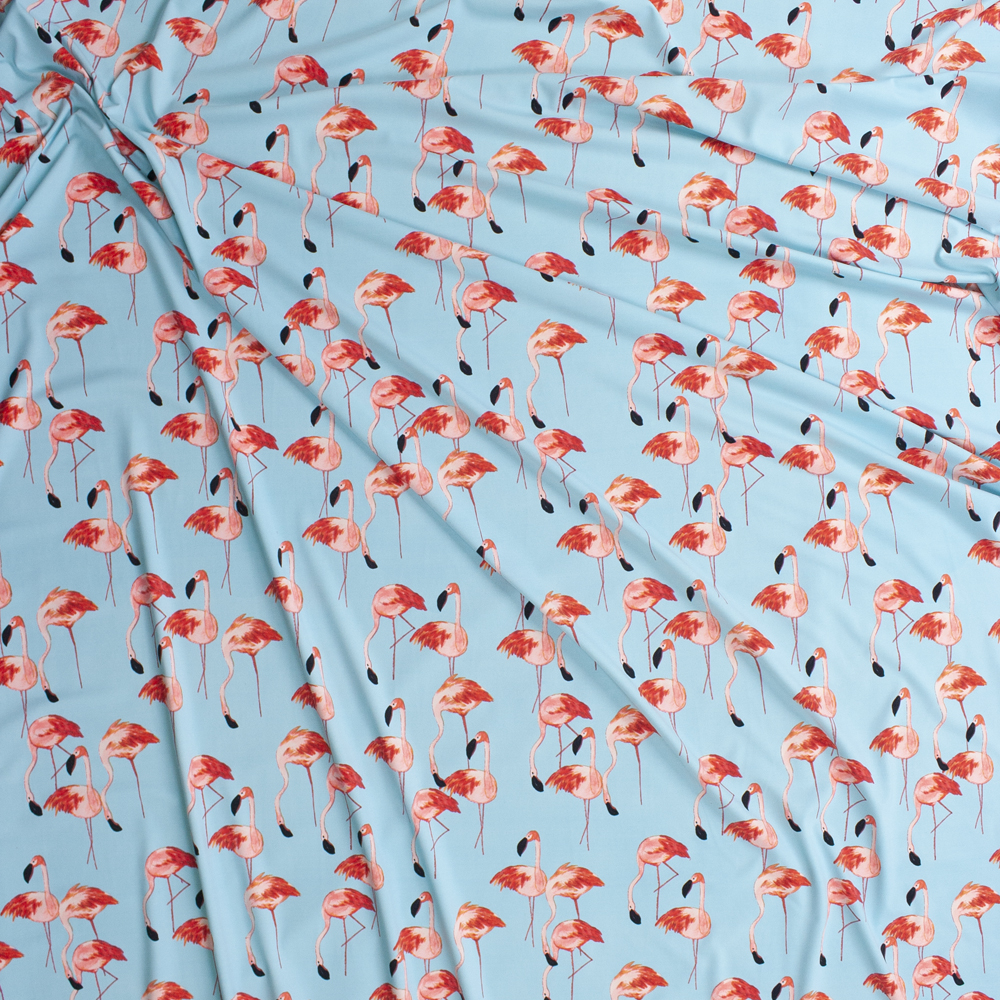 Pink Flamingos on Light Blue Nylon/Spandex from Manhattan Beachwear Fabric By The Yard - Wide shot