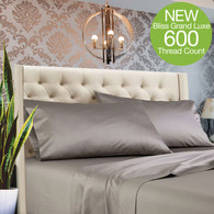 Bliss Grand Luxe Bamboo Sheet Set shown on bed in Polish Pewter
