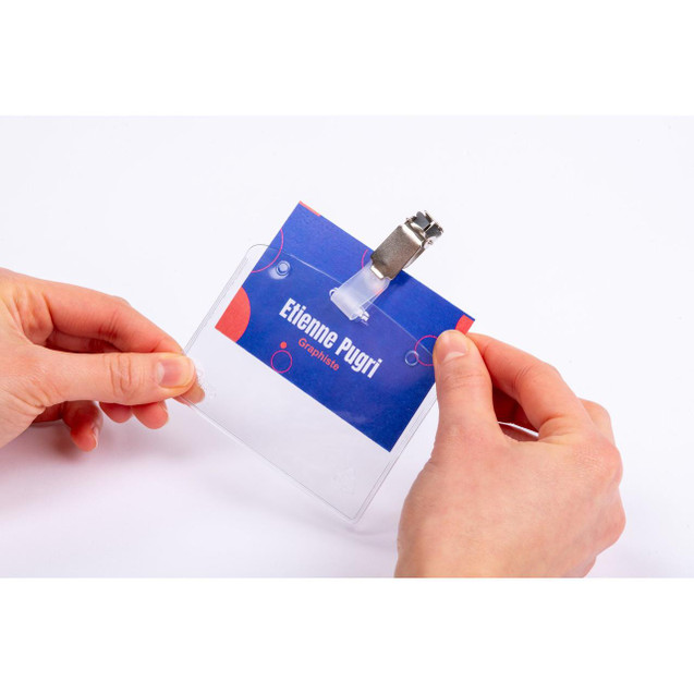 CW Office Avery Microperforated Printable Inserts 90mm x 60mm All Printers, transparent printable labels sheet being held by hand, featuring a sample label with the name Etienne Puyri.