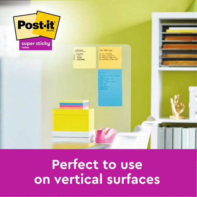 Post-it Super Sticky Large Notes Lined 101x152mm Assorted Colours Promo Pack 90 Sheets per Pad, image showing colorful sticky notes stuck on a transparent surface in an office setting.