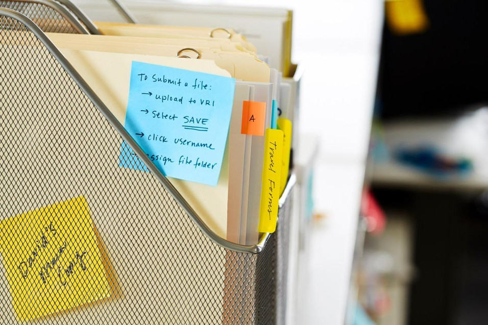 Post-it Note Cube 76x76mm 450 Sheets Pastel Blue 2028B - 7100172385, image showing a pastel blue sticky note on a file folder in an office setting