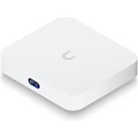 Various Ubiquiti UCG-ULTRA UniFi Cloud Gateway Ultra - Combined Router/UniFi Controller - UK Plug, front view of the compact white network device with USB port.
