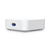 Various Ubiquiti UX7 UniFi Express 7 Ultra Compact Mesh Scalable Combined Router, WiFi 7 Access Point and Gateway, sleek white device with compact design and front blue indicator light.