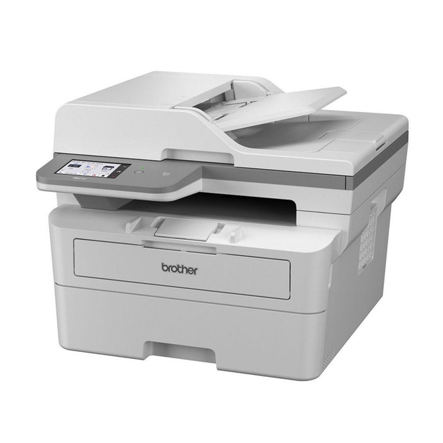 Brother MFC-L2980DW Professional Compact All-in-One Mono Laser Multifunction Printer, white and gray color with touchscreen display and paper input tray.