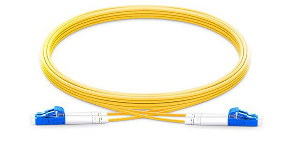 Various LC-LC OS2 Fibre Optic Cable Singlemode Duplex - Yellow 1m, yellow fiber optic cable with blue connector ends.