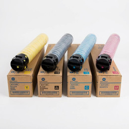 Konica Minolta TN-626 4 Colour Toner Cartridge Pack, four multi-coloured toner cartridges in yellow, black, cyan, and magenta placed on top of their respective boxes.