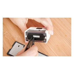 CW Office Avery Customisable Clothing Stamp Black - CSTAMP, person using scissors to customize the stamp
