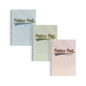Product CW Office Pukka Pad Haze Jotta A5 AST PK3, three spiral-bound notebooks with different geometric patterned covers in blue, green, and peach colors.