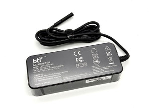 Various 127W AC Adapter for Microsoft Surface devices, with UK power cable, black rectangular design, detailed specifications, and safety certifications.