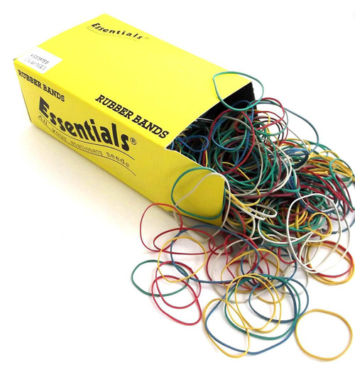 CW Office ValueX Rubber Band Assorted Colors, 454g, rubber bands spilling out of a yellow box labeled 'Essentials' for office and stationery needs.
