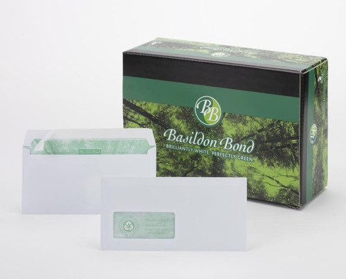 CW Office Basildon Bond P&S Wdw WT DL PK500, pack of 500 white envelopes with green interior, with a matching enclosure card, placed next to a decorative green and black box featuring Basildon Bond branding and a scenic nature background.
