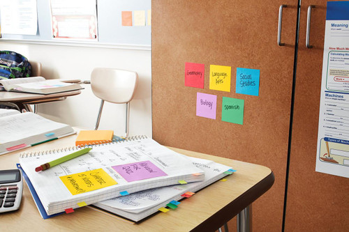 Post-it Post it Super Sticky Notes Boost Colours 76x127mm 90 Sheets Pack 5, colorful sticky notes on a classroom or office desk and walls for organization.
