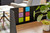 Post-it Super Sticky Notes Playful Colours 76x127mm 90 Sheets Pack 6, colorful sticky notes arranged on a black divider in an office setting.