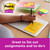 Post-it Super Sticky Notes 101x152mm Ruled, Pack of 90 Sheets in Cosmic Colours, shown in an image with a person writing on a yellow sticky note on a notebook, surrounded by other colorful notes and stationery, perfect for organizing and listing tasks.