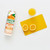 CW Office Orange Juice 6 x 1L, a carton of refreshing orange juice with halved fresh oranges and a glass of orange juice on a yellow cutting board.