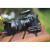 Various Verbatim (49876) AAA Battery Alkaline 20 Pack, image of a set of AAA alkaline batteries from Verbatim placed next to a professional video camera on a wooden surface.