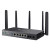 Various TP-Link Omada DR3650v-4G AX3000 Wi-Fi 6 Gigabit Desktop DSL Gateway, front view of the network device with four antennas and multiple port connections.