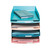 CW Office Skandi Letter Tray Ast. Col PK 4, a set of four colorful plastic letter trays stacked with a blue tray on top holding a blue fabric-covered notebook inside.