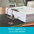 CW Office Oxford 70MM Lever Arch A4 Met Silver, a silver metal lever arch file holding a thick stack of documents with colorful charts and text, on a wooden desk.
