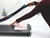 CW Office Avery A3 Precision Guillotine, person using cutting device on paper with cutting grid and safety shield.