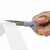 CW Office Westcott Titantwpk Scissor 130/180MM, gray and yellow-handled scissors cutting white ribbon material.