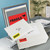 CW Office Avery Neon Labels Neon Yell PK25, fluorescent yellow labels with bold black 'URGENT' and 'FRAGILE' warning symbols and text on mailing envelopes and labels.