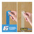 CW Office Multi-Surf Masking Tape 36MMX41M P6, close-up image showing the application of blue and beige masking tape on wooden surface for painting or decorating projects.