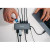 CW Office Verbatim USB-C Pro Multiport Hub 14 Port CMH-14, 14-port USB-C hub connecting multiple cables and devices beside a laptop