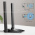 CW Office TP-Link Archer TX20U Plus AX1800 High Gain Dual Band Wi-Fi 6 USB Adapter, black USB Wi-Fi adapter with two high-gain antennas and a diagram illustrating wireless signal coverage