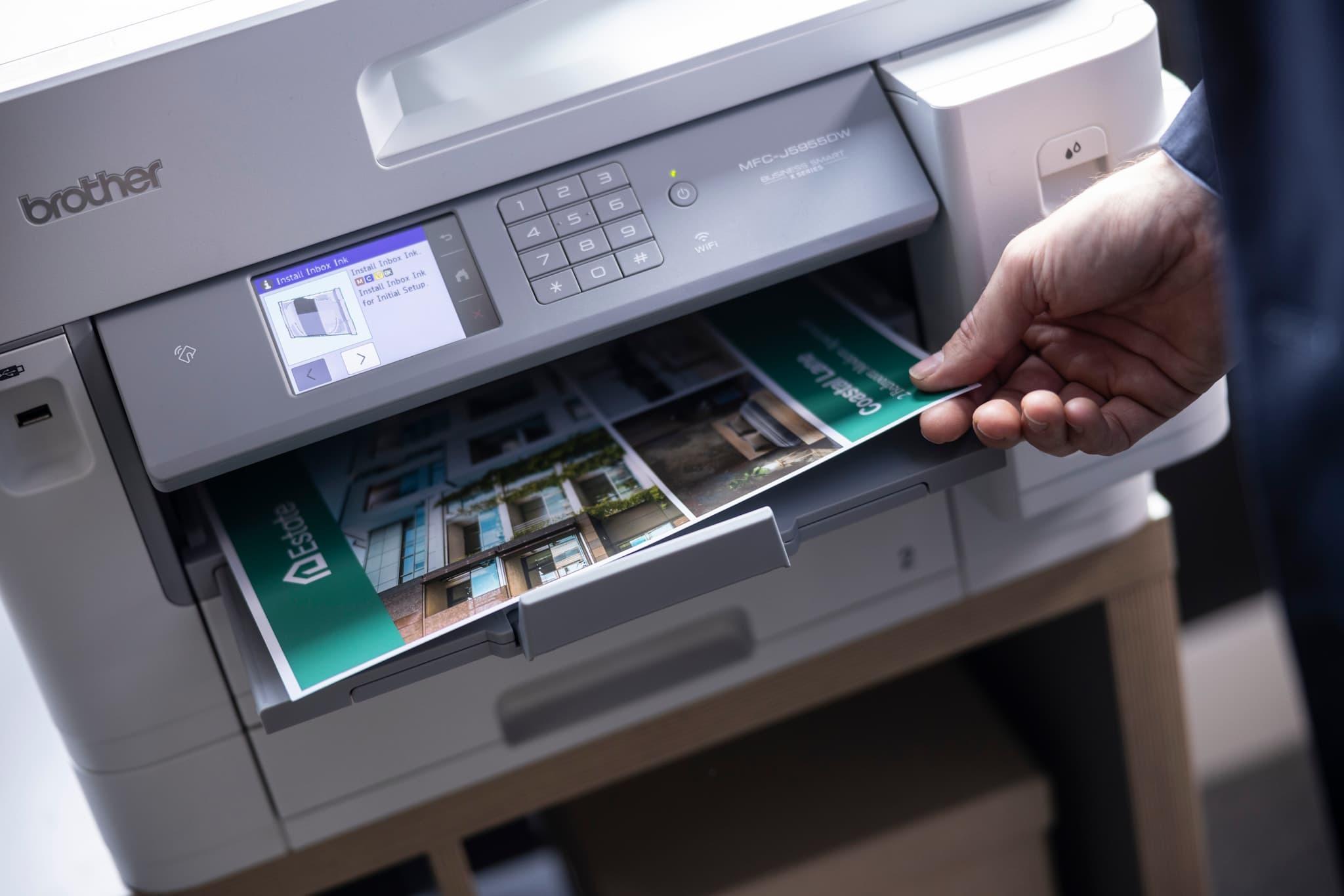 a printer with paper coming out of it