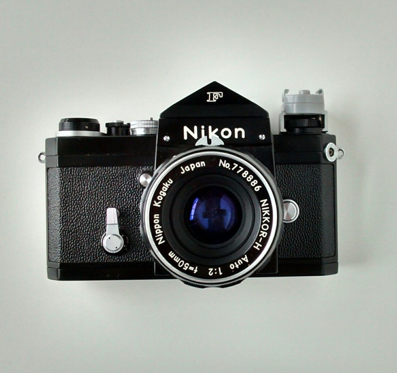 Nikon F 35mm Single-Lens Reflex Camera with Eye-level Prism Finder, Nippon Kogaku Japan NIKKOR-H Auto 1:2 f=50mm Lens